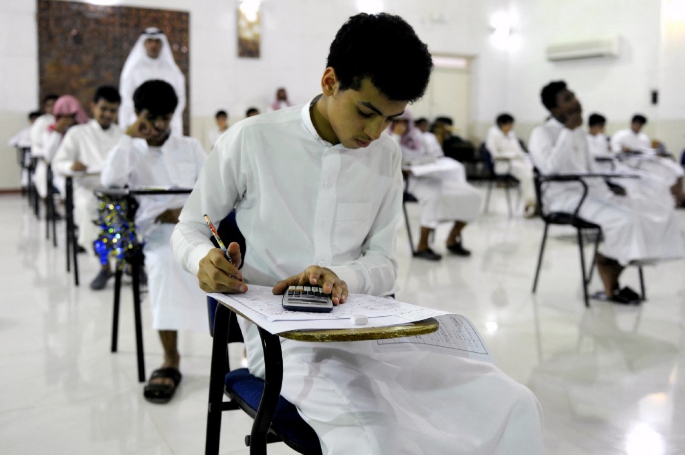 Saudi students sit for their final high school exams in Jeddah on 24 May 2015.