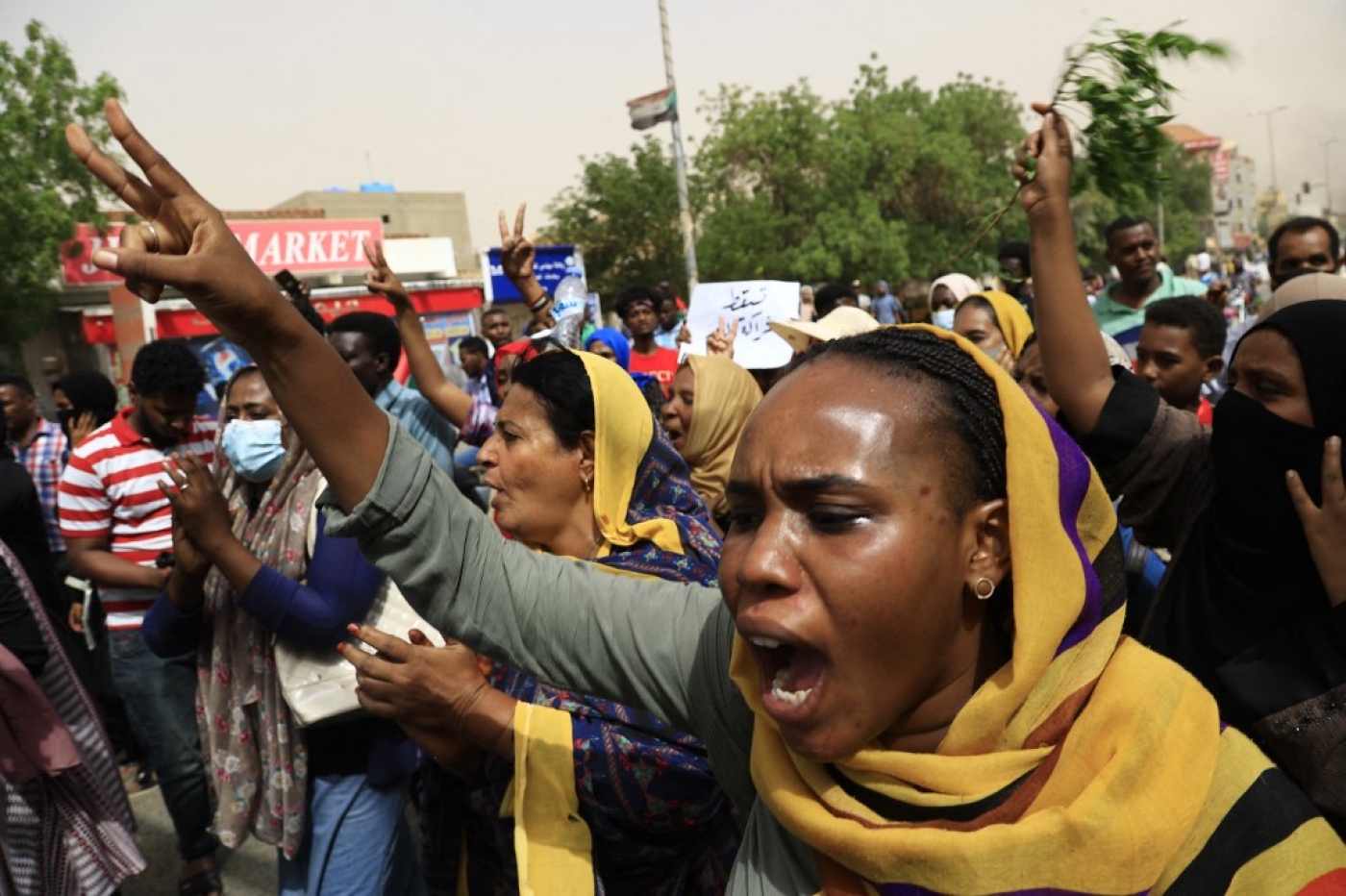 Sudanese march during a protest in the capital Khartoum urging the government to step down over recent harsh economic reforms on 30 June 2021.
