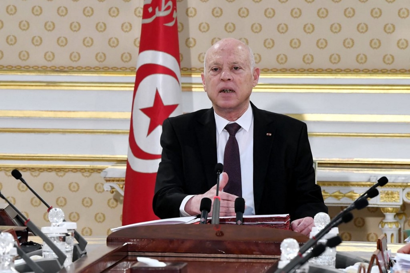 A handout picture provided by the Facebook Page of the Tunisian Presidency on 13 December 2021 shows President Kais Saied attending a cabinet meeting in the capital Tunis.
