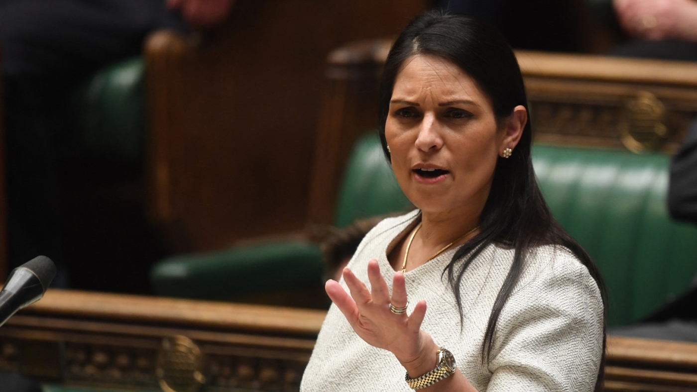 Britain's Home Secretary Priti Patel gives a statement concerning the deal plan to send migrants and asylum seekers who cross the Channel to Rwanda, at the House of Commons, in London, on 19 April, 2022 (AFP)