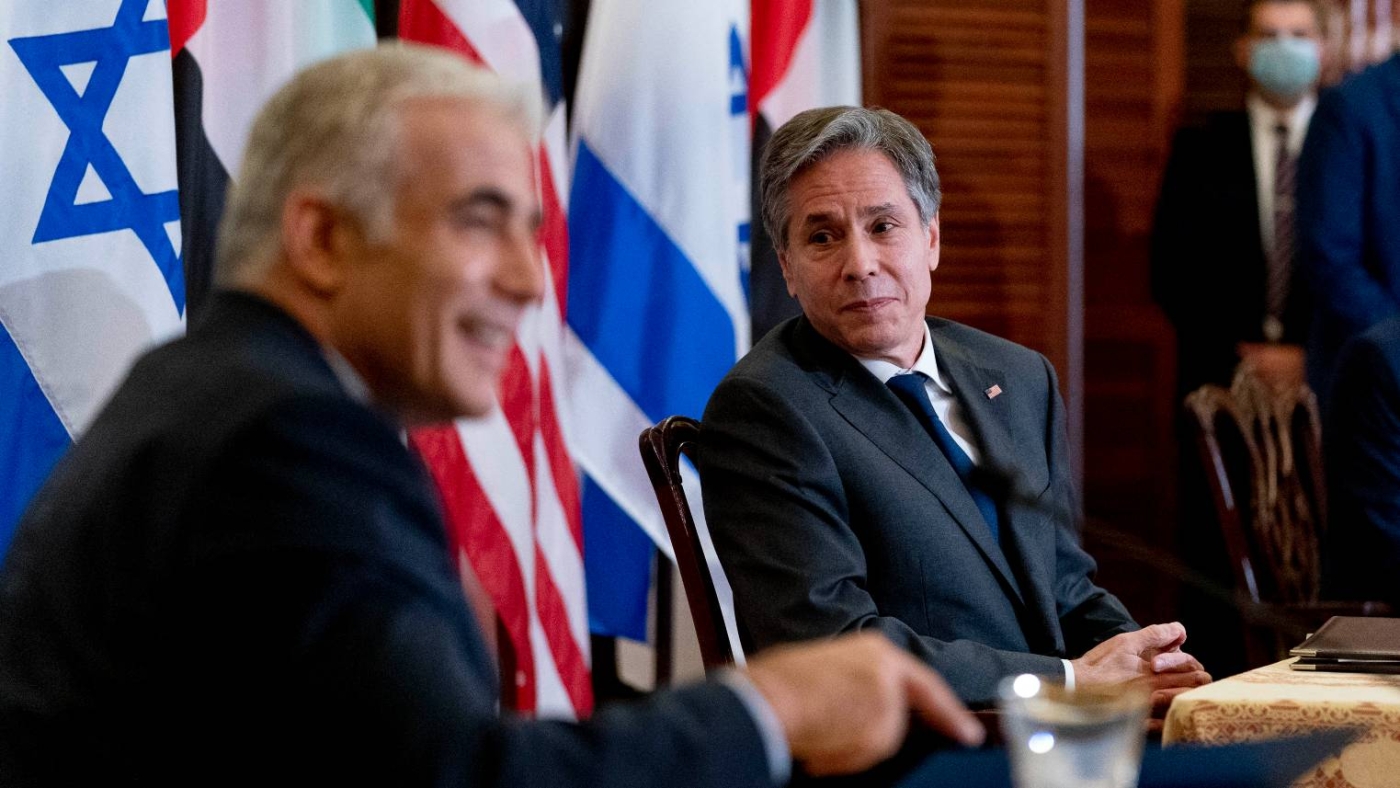 Israeli Foreign Minister Yair Lapid (R) and US Secretary of State Antony Blinken take part in a joint news conference at the State Department in Washington on 13 October 2021.