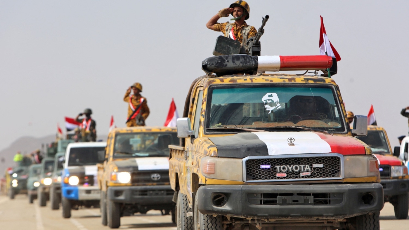 Fighters loyal to Yemen's Saudi-backed government take part in a military parade in the Marib province on 26 September 2022.