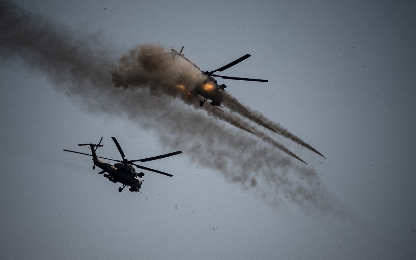 Un hélicoptère russe Mi-28 lors d’exercices militaires avec des troupes chinoises et iraniennes sur le champ de tir Raïevski, dans le sud de la Russie, le 23 septembre 2020 (AFP)
