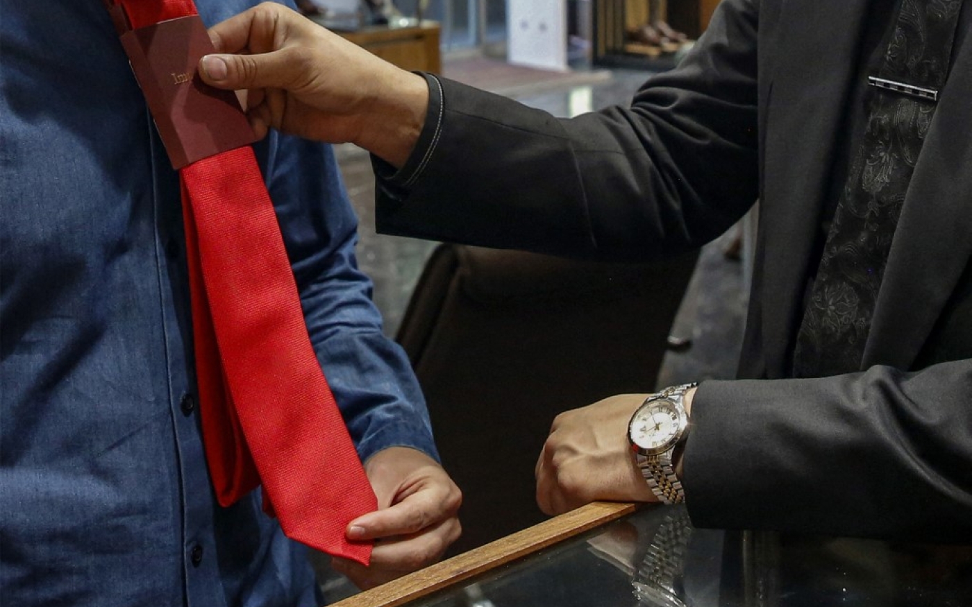 After the fall of the Shah in 1979, the Iranian clergy, who came to power with Ayatollah Ruhollah Khomeini, banned the tie, which in their eyes symbolized subjugation to Western culture (AFP)