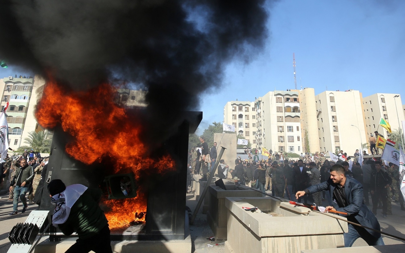 Iraqi protesters set ablaze a sentry box in front US embassy Baghdad December 2019 afp