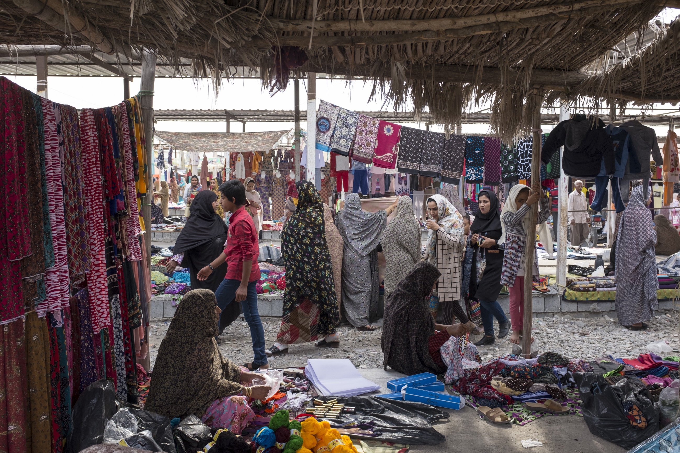 The Panjshambe bazaar is also where women can buy and sell masks. The majority there are masked as they conduct their business without male escorts (MEE)