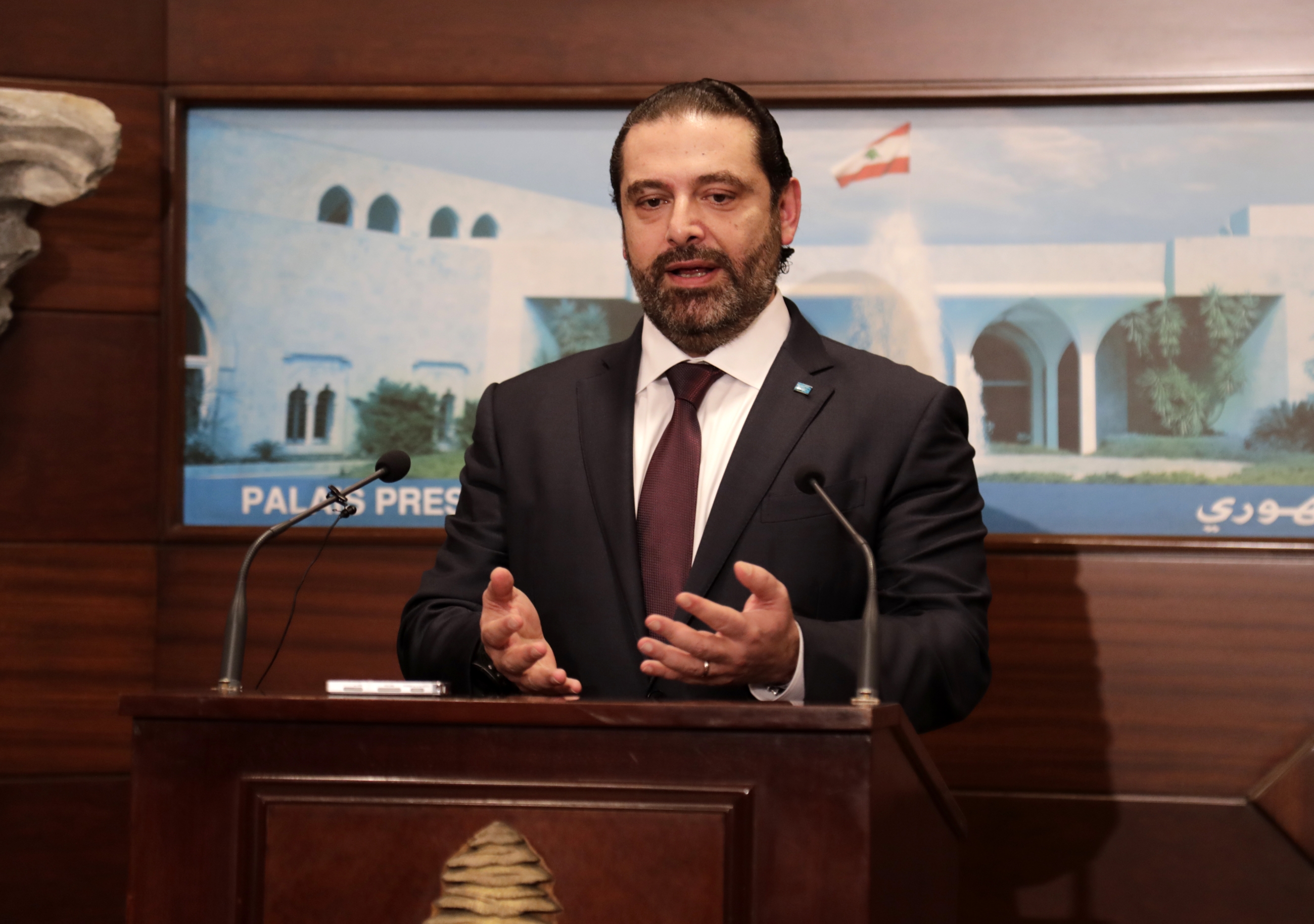 Lebanese Prime Minister Saad Hariri addresses the media after announcing the new cabinet (AFP)