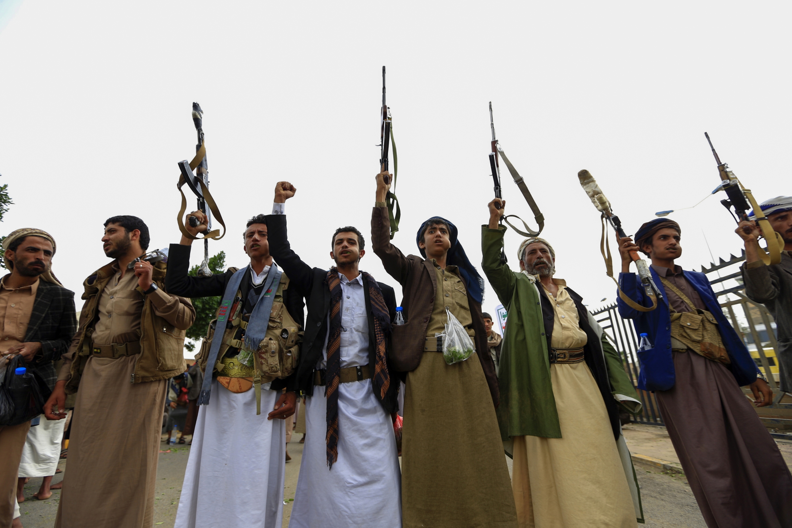 Tribal gunmen loyal to Yemeni Houthi movement take part in rally in Sanaa