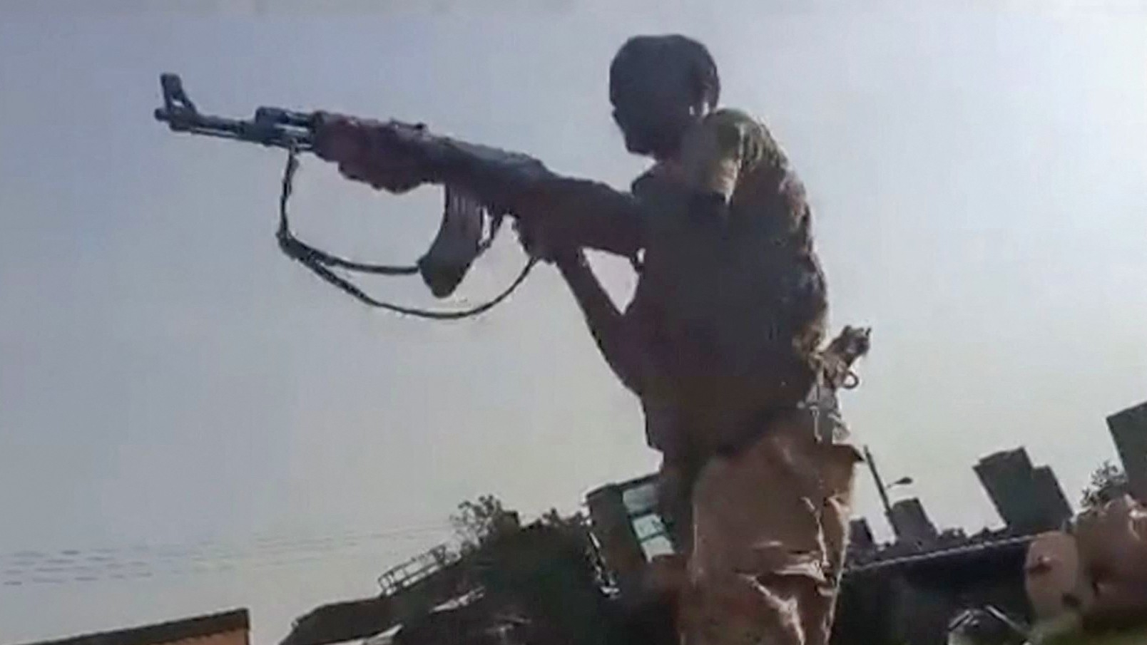 A screenshot purportedly showing Sudanese soldiers firing at Rapid Support Forces (RSF) fighters in Khartoum (AFP)