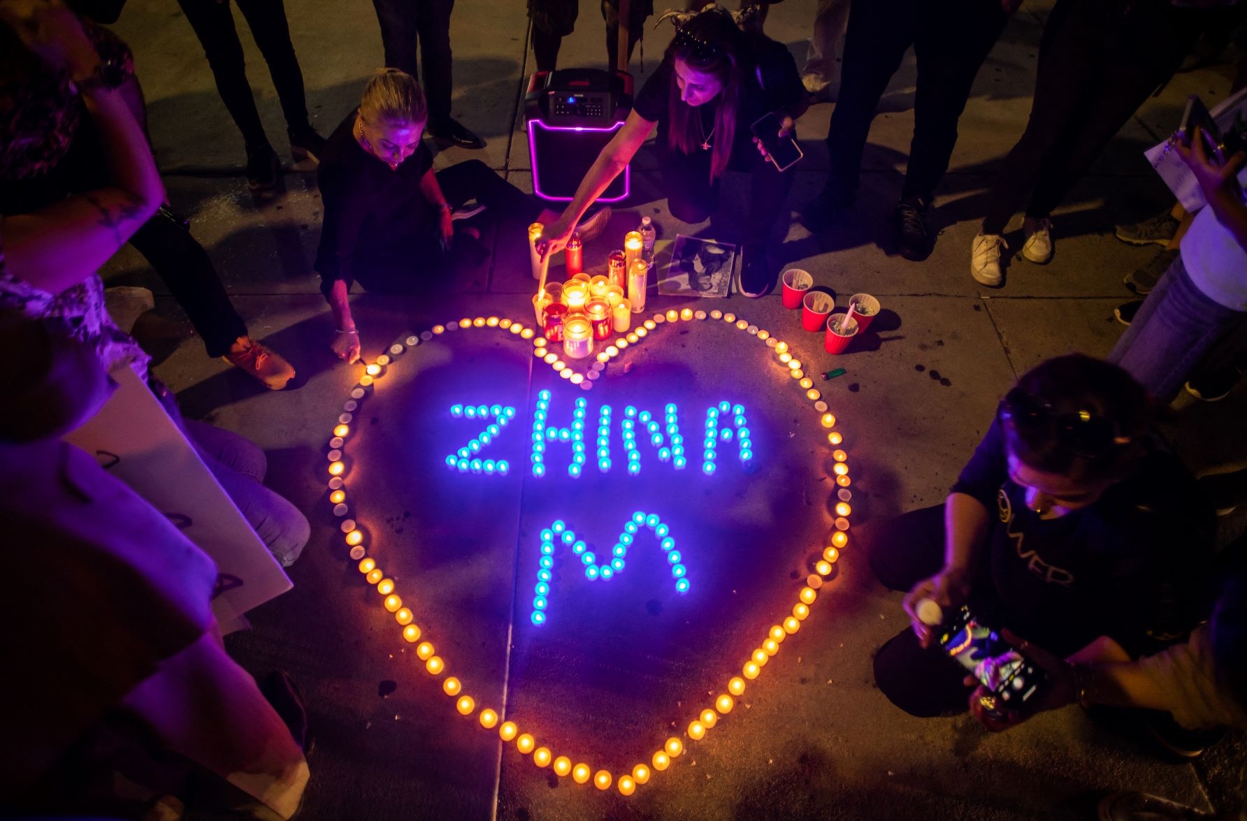 Californian Kurds hold a demonstration and candlelight vigil to honor the memory of Mahsa Amini - who also had the Kurdish name 'Zhina' - in front of the Federal Building on September 22, 2022 in Los Angeles, California (AFP)