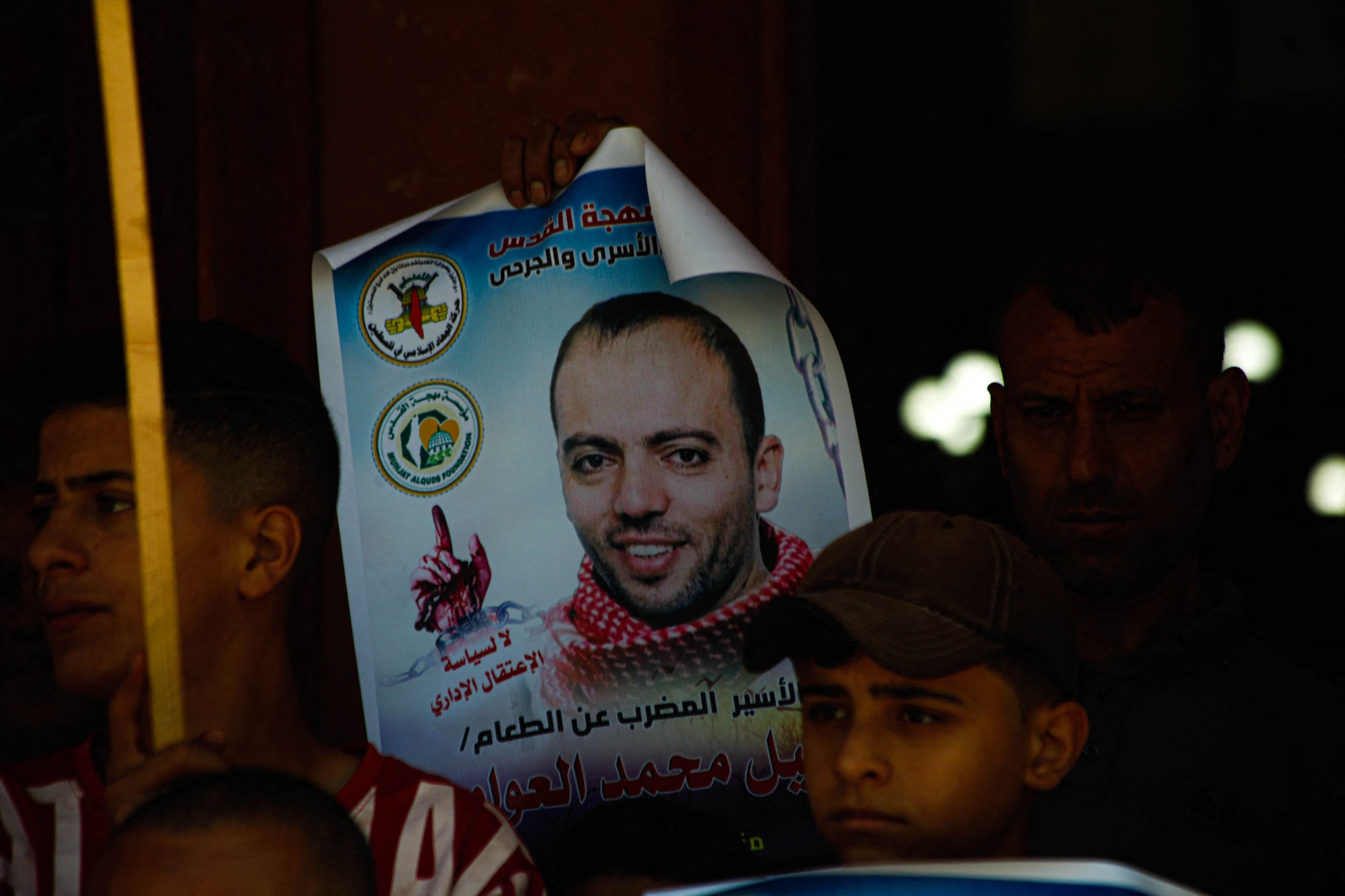 Solidarity pause of the two hunger strikers, Khalil Al-Awawda and Raed Rayan, and rejection of the policy of administrative detention in Israeli prisons, in Gaza City on 10 June 2022 (Reuters)