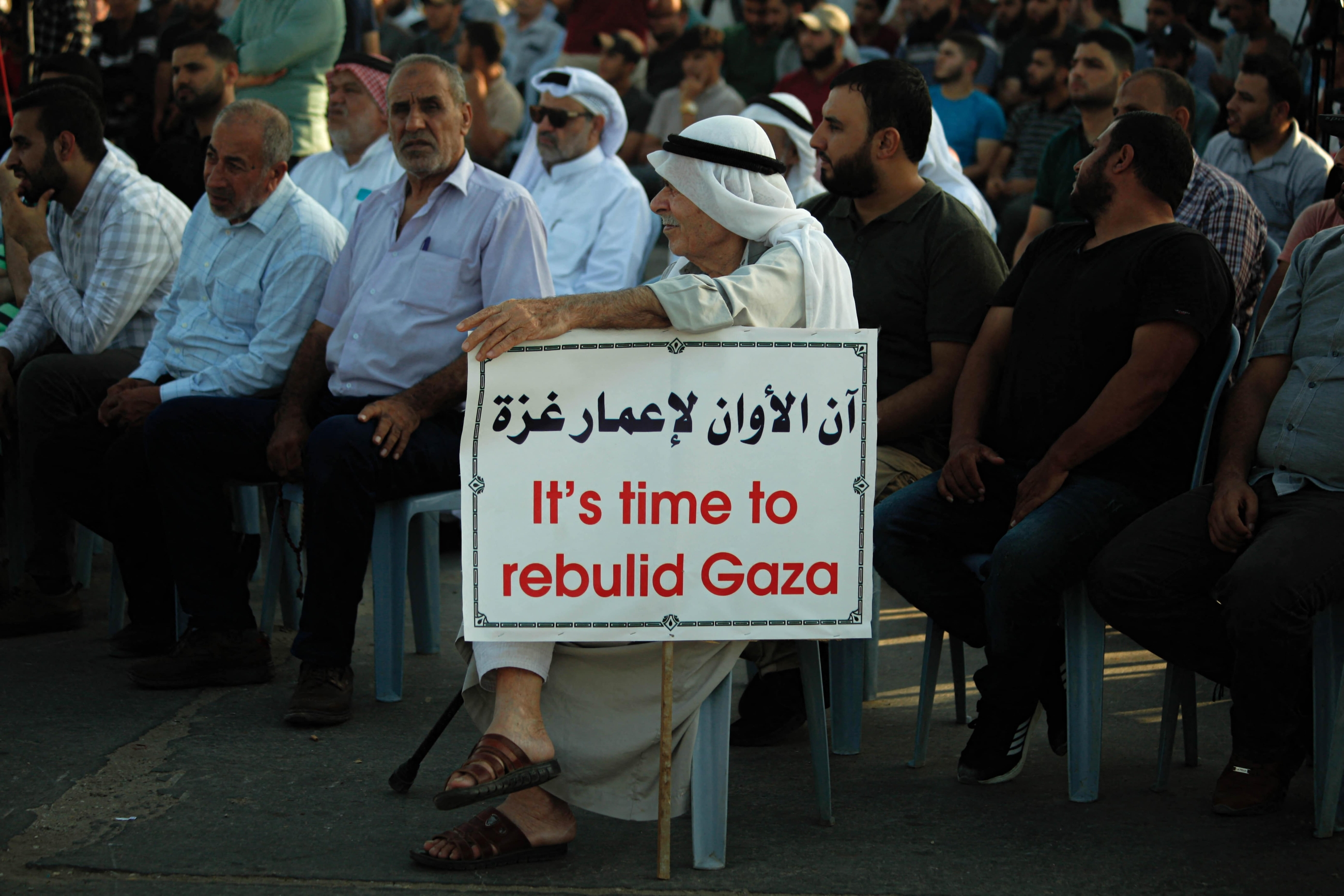Palestinians participate in a rally at the Gaza City sea port, in which they demand their right to receive gas from a maritime field off Israel and the the lift of the blockade, on 13 September 2022 (ABACA via Reuters)