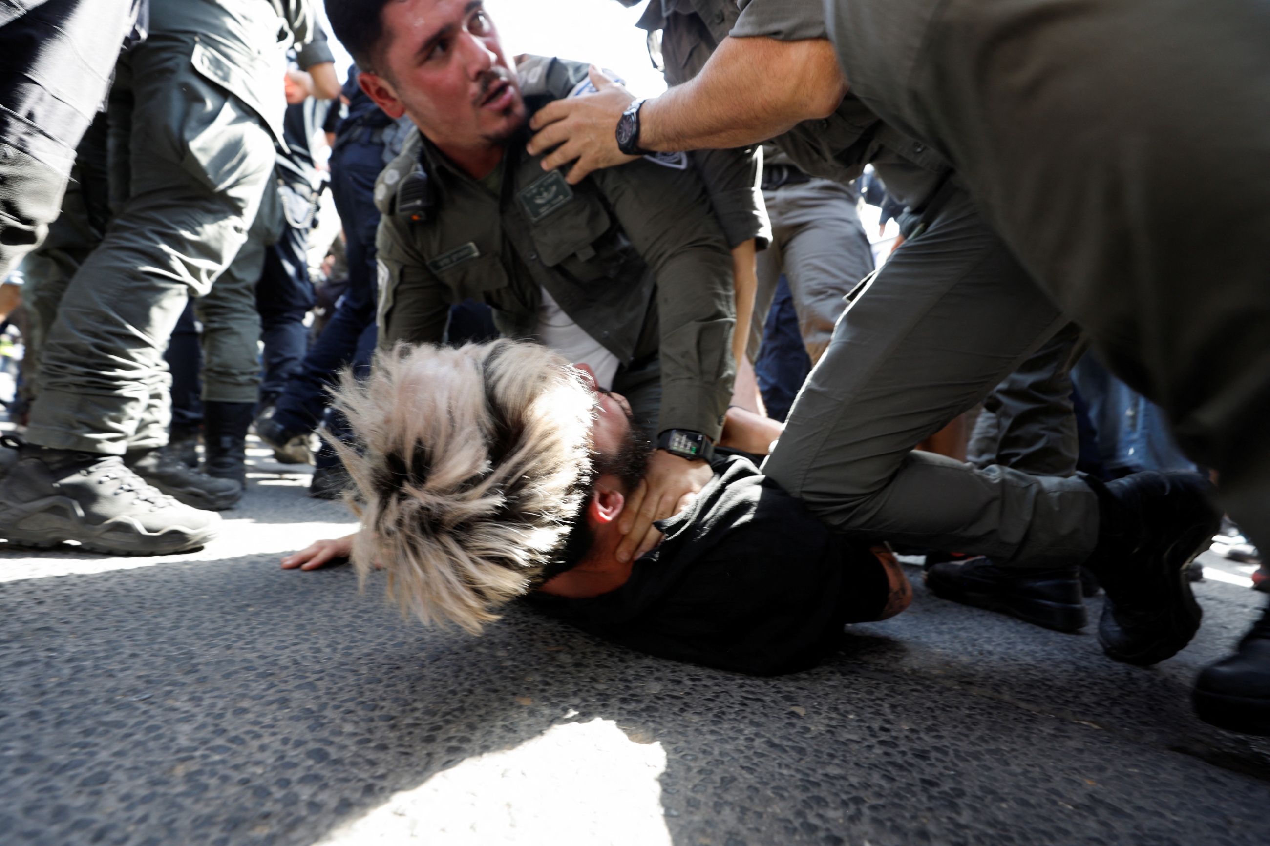 Israeli police detain a man during a demonstration in Tel Aviv on 1 March 2023 (Reuters)