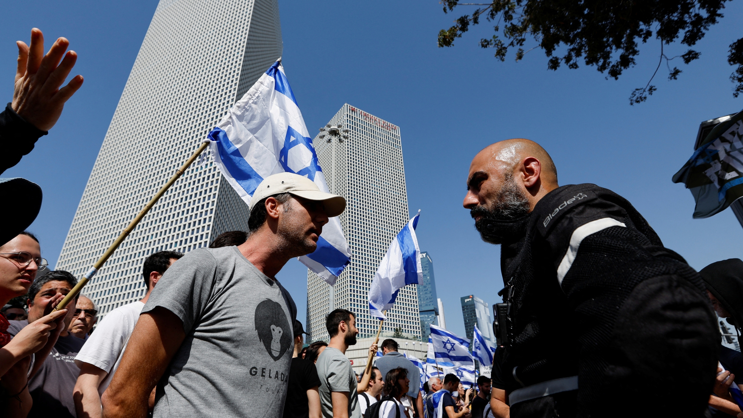 Protesters confront Israeli police at a demonstration in Tel Aviv on 1 March 2023 (Reuters)