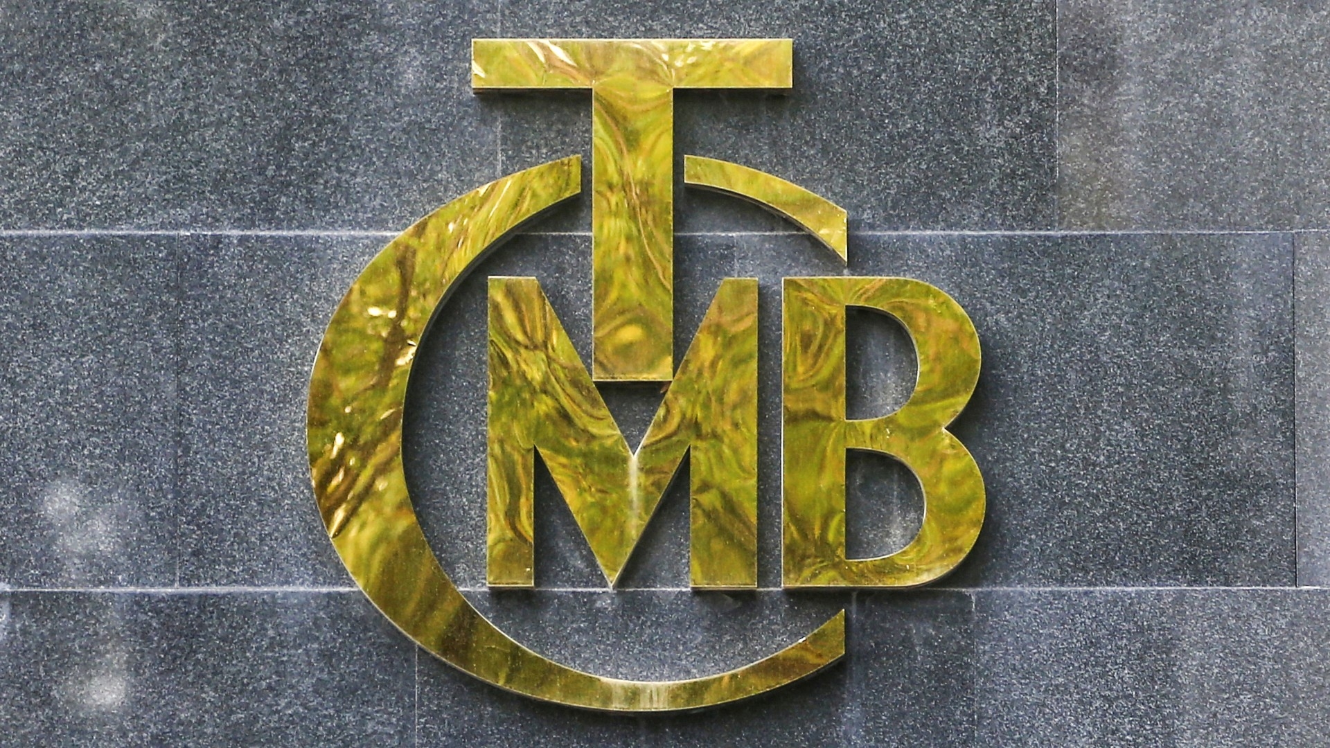 A logo of Turkey's Central Bank is pictured at the entrance of its headquarters in Ankara (Reuters)