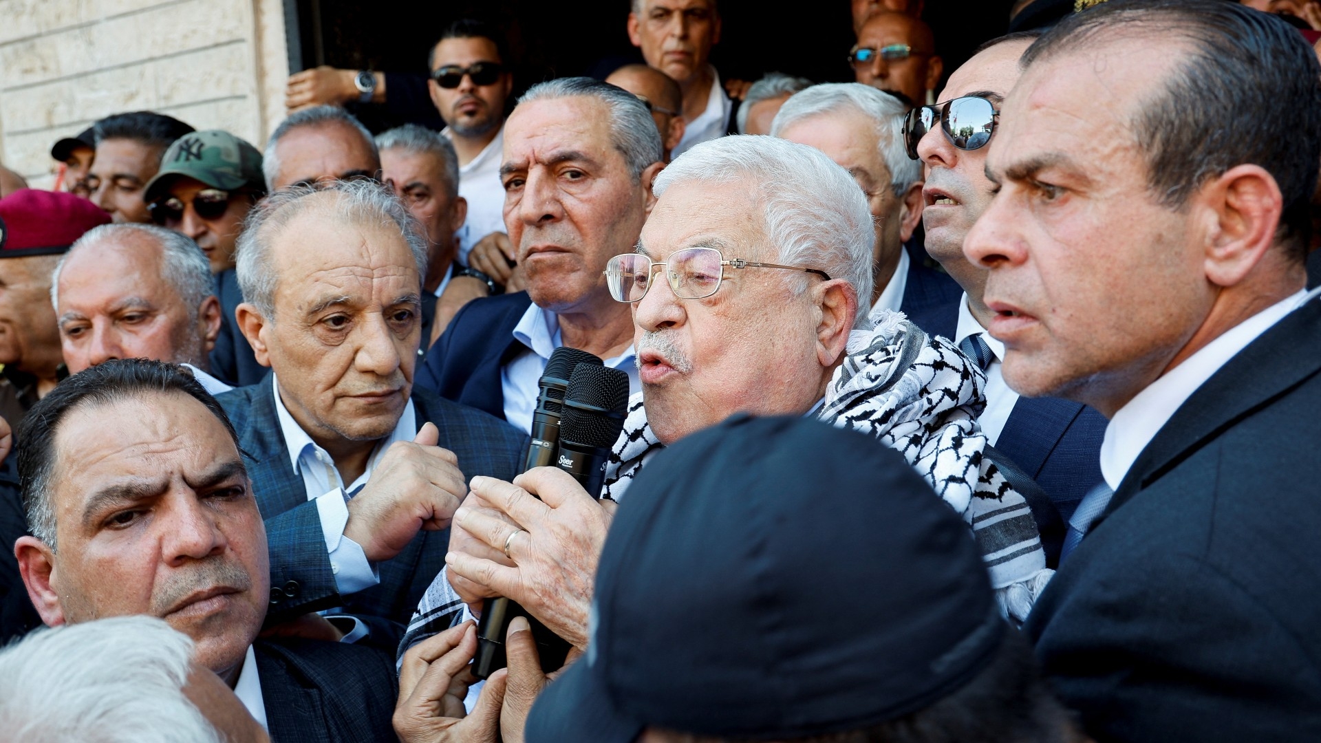 Palestinian President Mahmoud Abbas speaks as he visits Jenin in the Israeli-occupied West Bank, 12 July (Reuters)