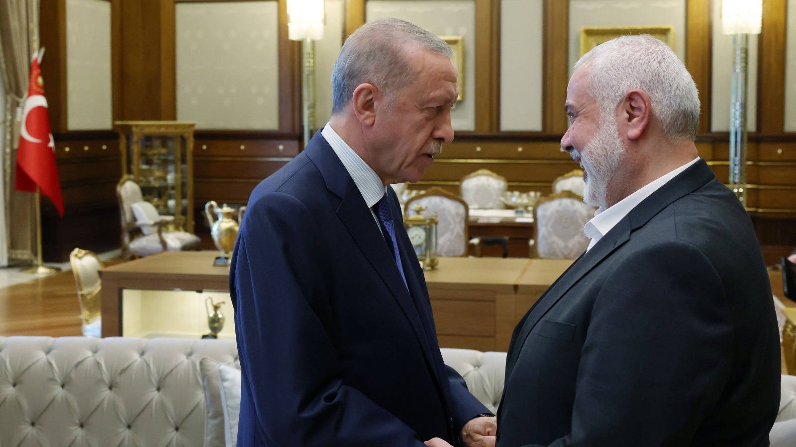 Turkish President Recep Tayyip Erdogan meets with Hamas political leader Ismail Haniyeh in Ankara on 26 July (Reuters)