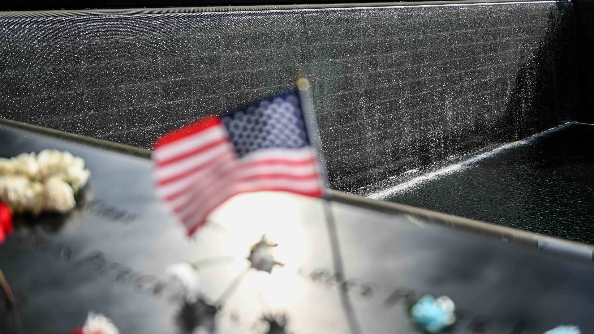 An American flag is displayed at the 9/11 Museum and Memorial on the 20th anniversary of the attacks on the World Trade Center, in New York, on 11 September 2021.