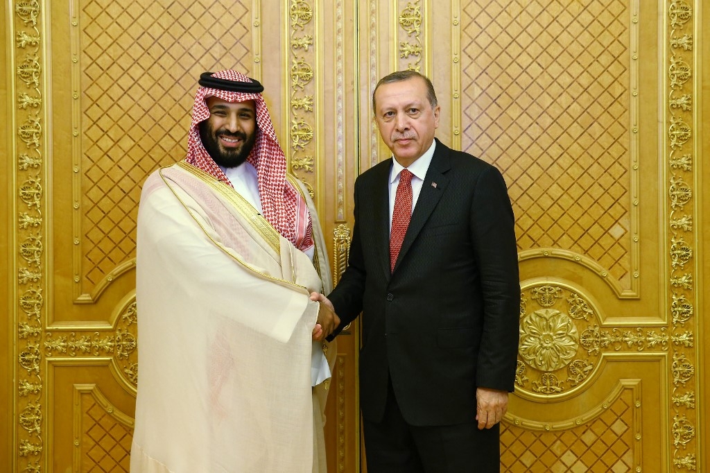 Turkish President Recep Tayyip Erdogan (R) shaking hands with Saudi Crown Prince Mohammed bin Salman (L) during a meeting as part of an official visit in Jeddah, Saudi Arabia.