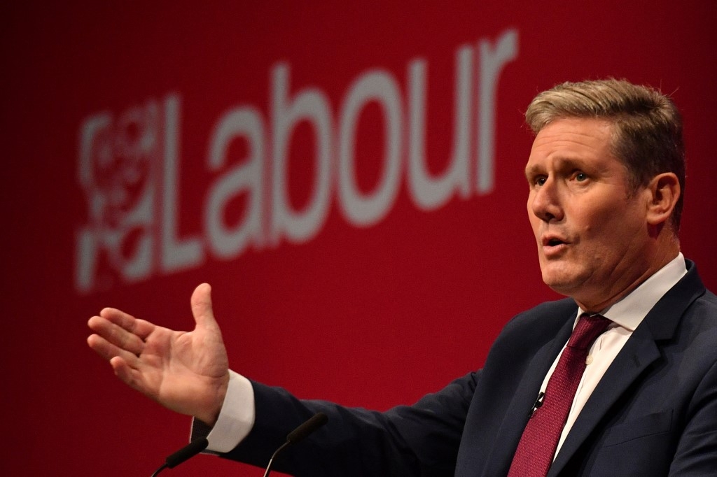 Labour leader Keir Starmer addresses the annual Labour Party conference in Brighton, England, on 9 September 2021 (AFP)