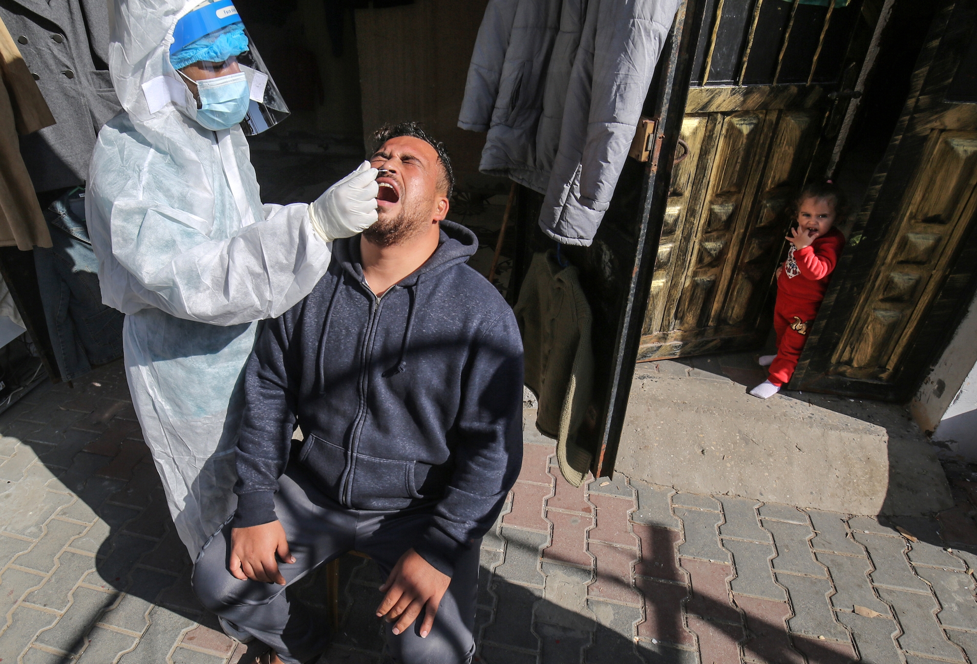 Palestinian coronavirus swap test Gaza AFP