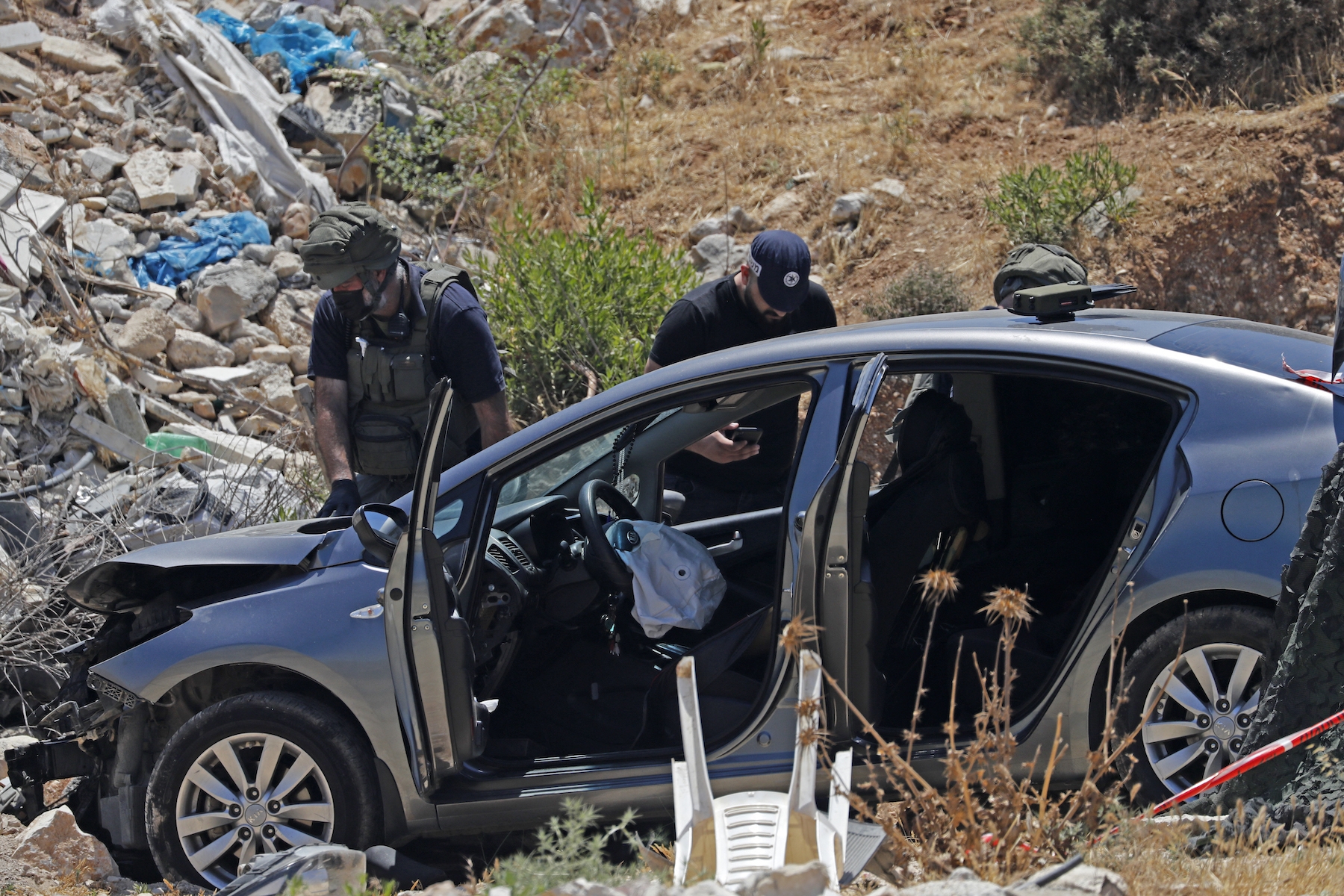 Palestinian woman car israeli soldiers AFP