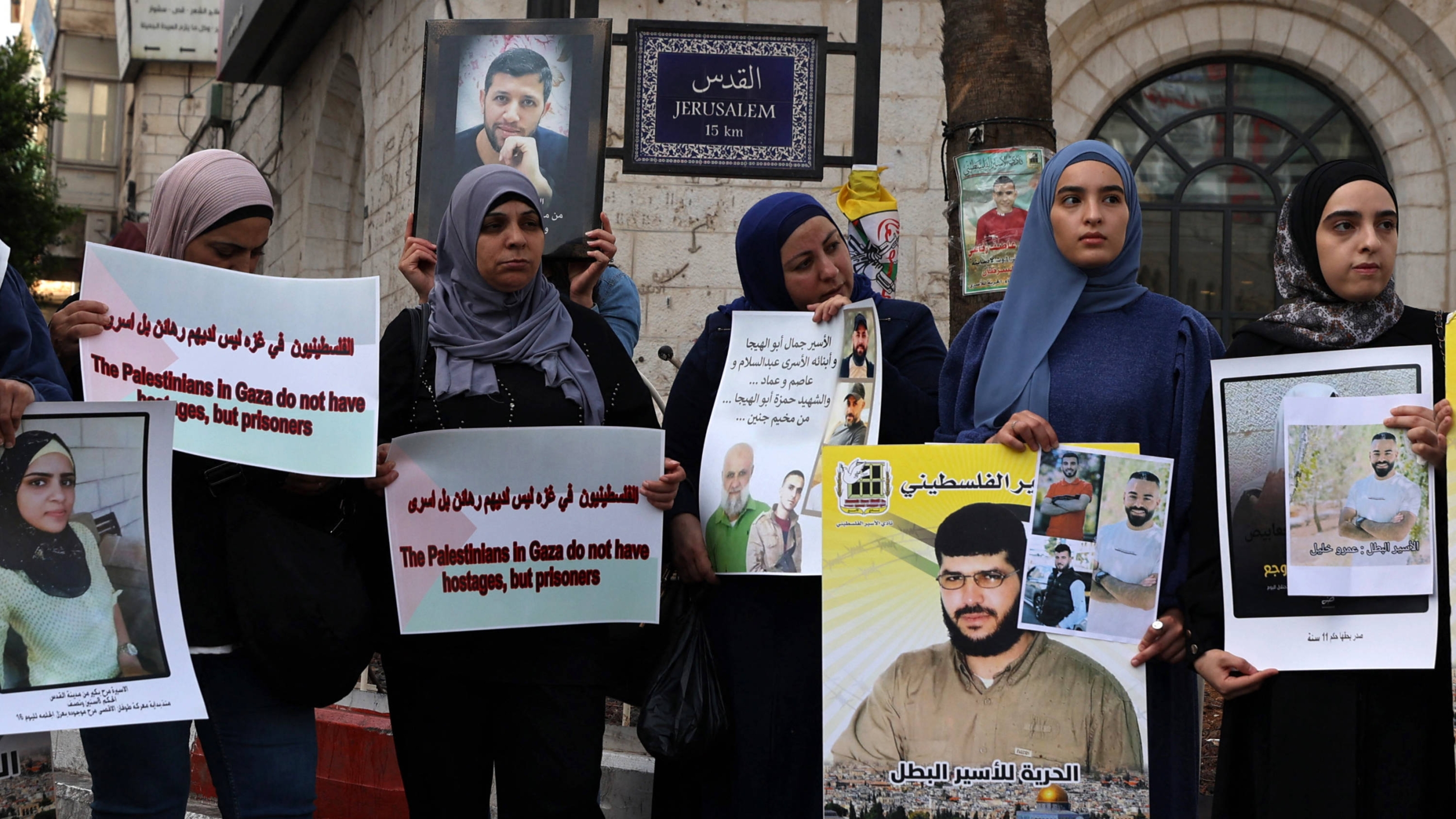 Families of Palestinian prisoners in Israeli jails attend a demonstration in Ramallah demanding their release and to express their solidarity with Palestinians in Gaza, 22 October 2023 (AFP)