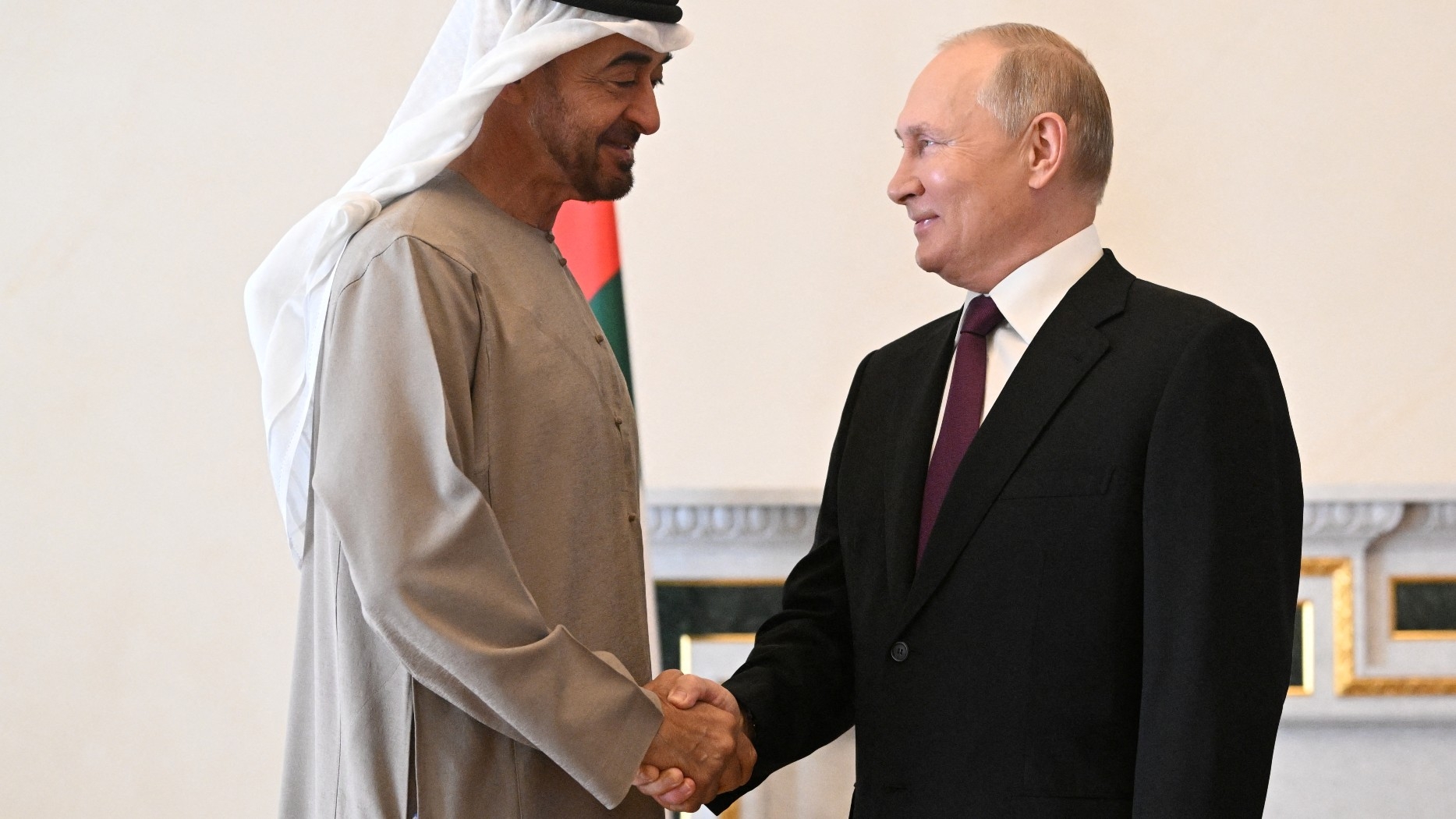 Vladimir Putin shakes hands with the UAE President Sheikh Mohammed bin Zayed al-Nahyan in Saint Petersburg in October 2022