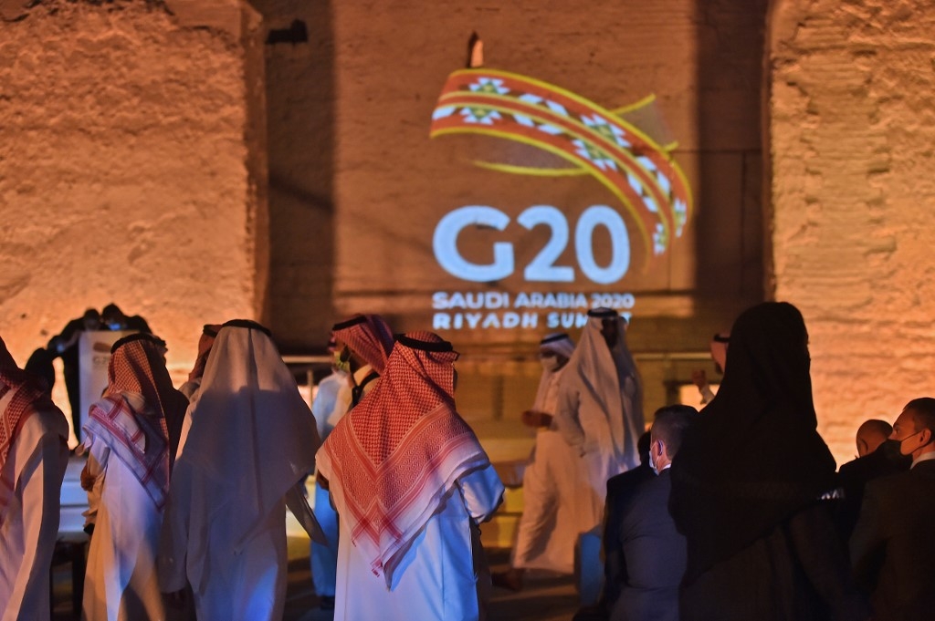 The G20 logo is projected at the historical site of al-Tarif in Diriyah district
