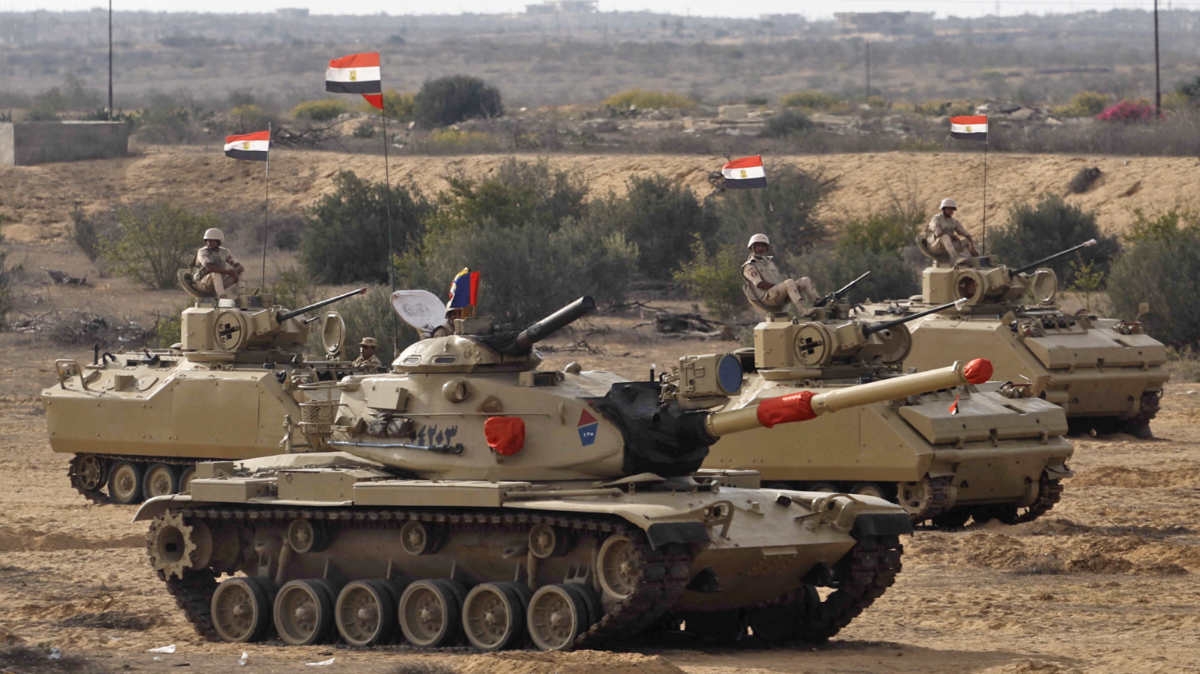 Egyptian tanks are deployed near the Rafah crossing with Gaza, on 31 October 2023 (AFP)