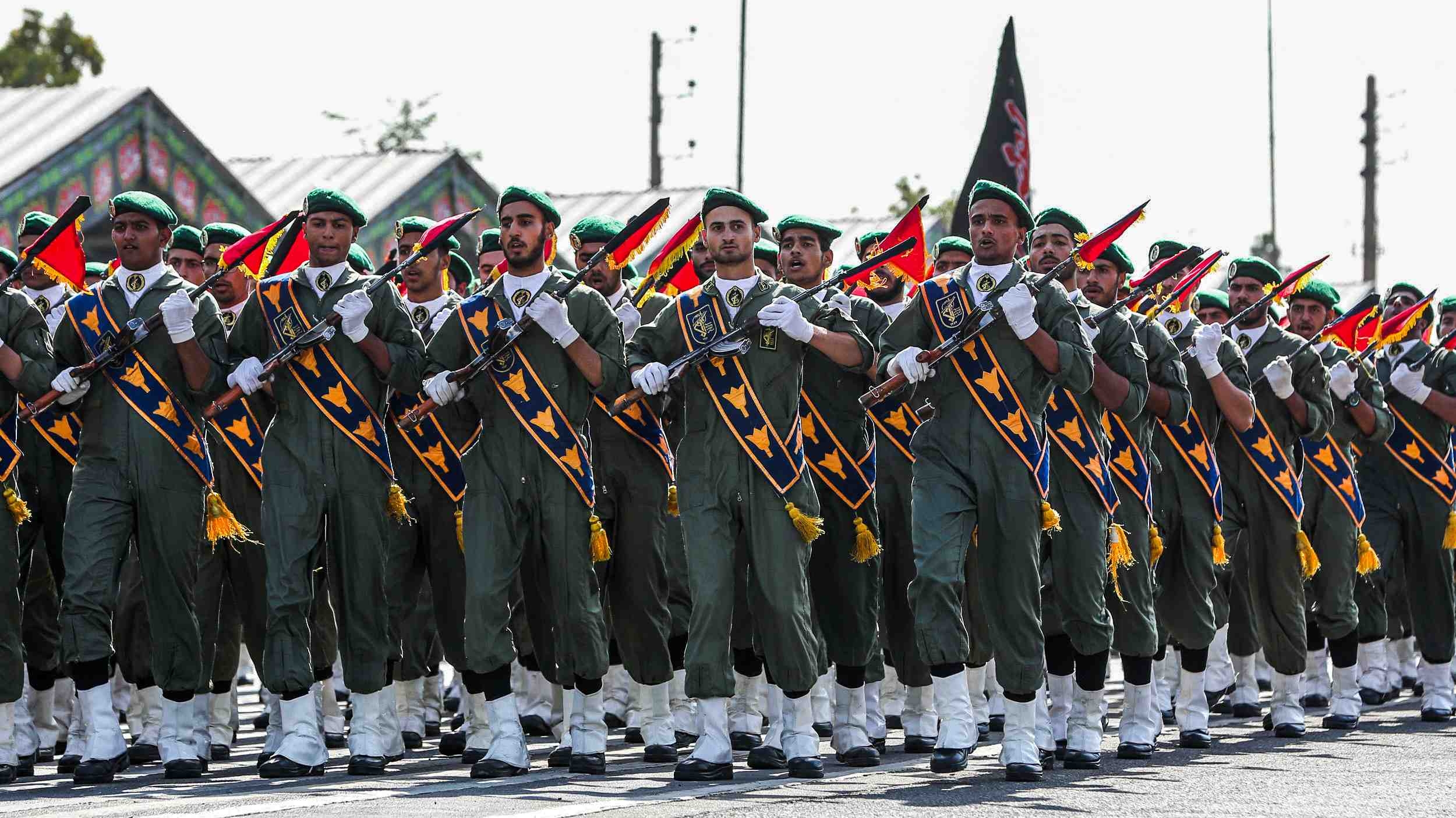 Members of Iran's Islamic Revolutionary Guard Corps march during the annual "Sacred Defence Week" military parade in the capital Tehran on 22 September 2019.