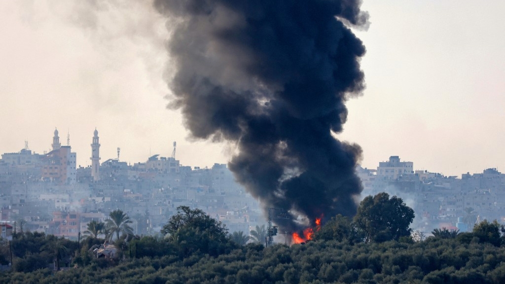 Smoke billows over Gaza during Israeli bombing on 18 January 2024 (Jack Guez/AFP)