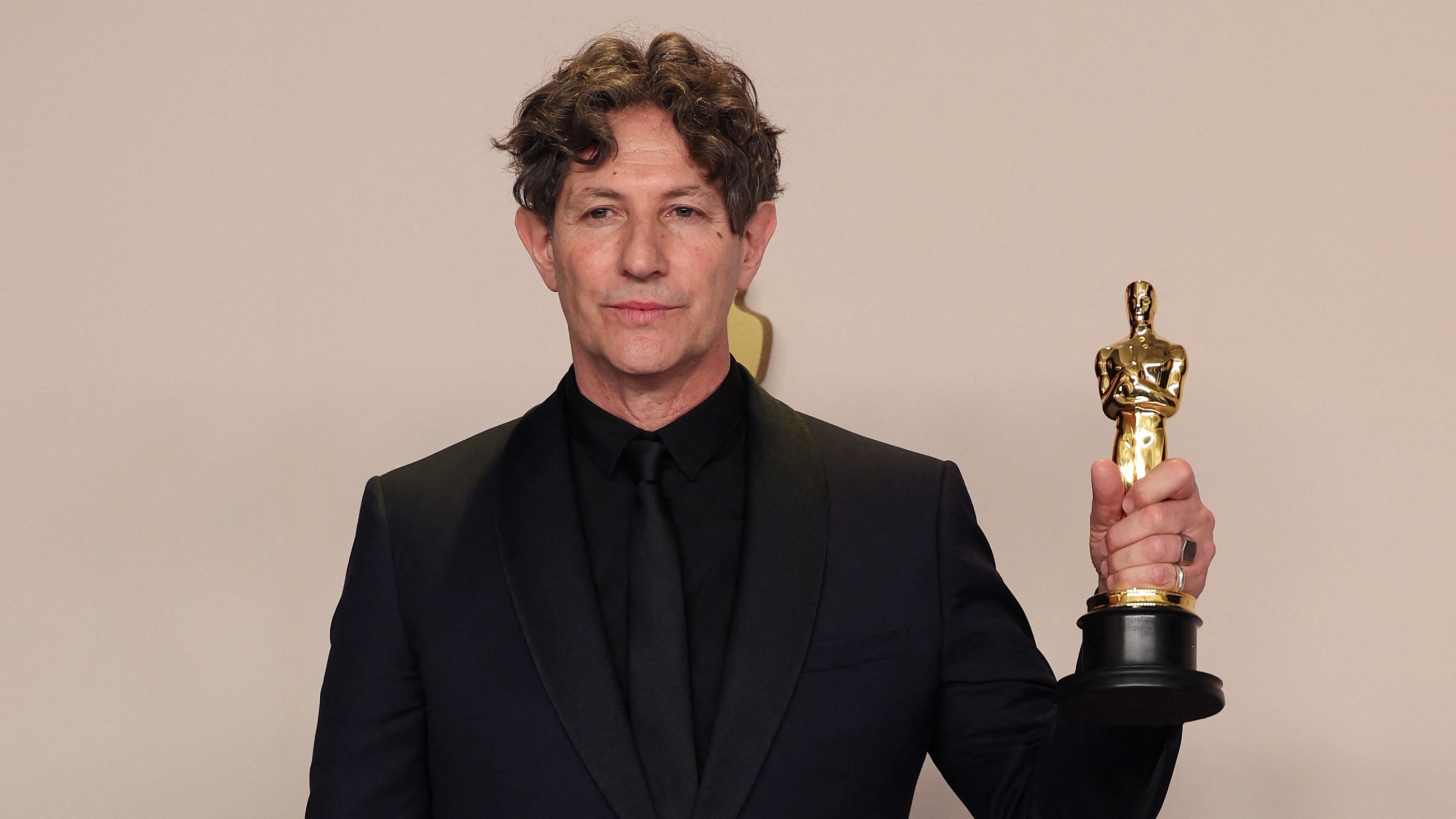Jonathan Glazer poses with the Oscar for Best International Feature Film for "The Zone of Interest" (Reuters/Carlos Barria).