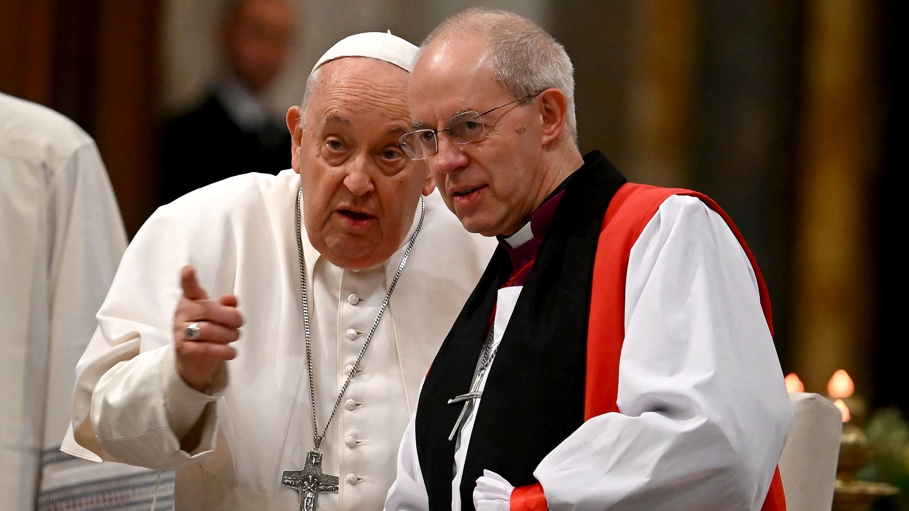 Welby (right) meets Pope Francis at the Basilica of Saint Paul Outside the Walls in Rome in January 2024 (AFP)