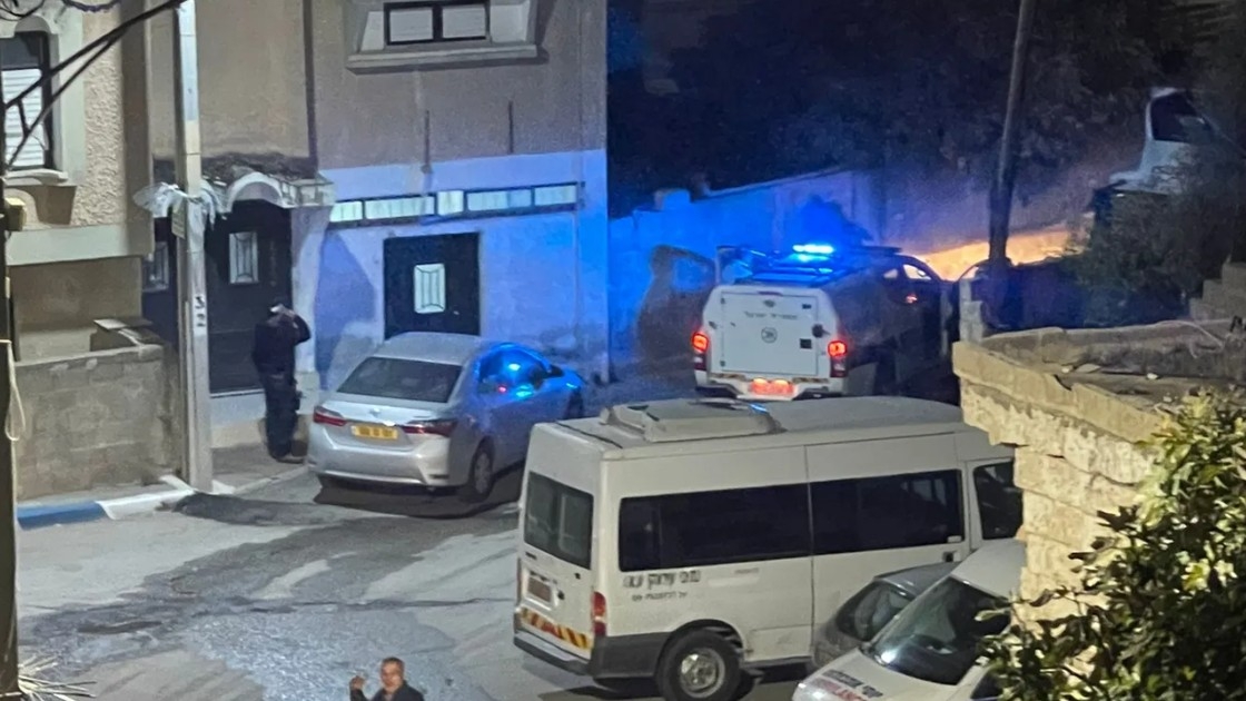 Israeli police surround a building in the city of Kafr Qasem where a Palestinian man was fatally shot (social media)