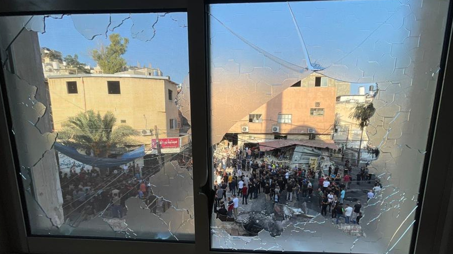 The view from a destroyed window, after an Israeli incursion on Nour Shams refugee camp in the occupied West Bank on 5 September 2023 (MEE/Hisham Abu Shaqra)