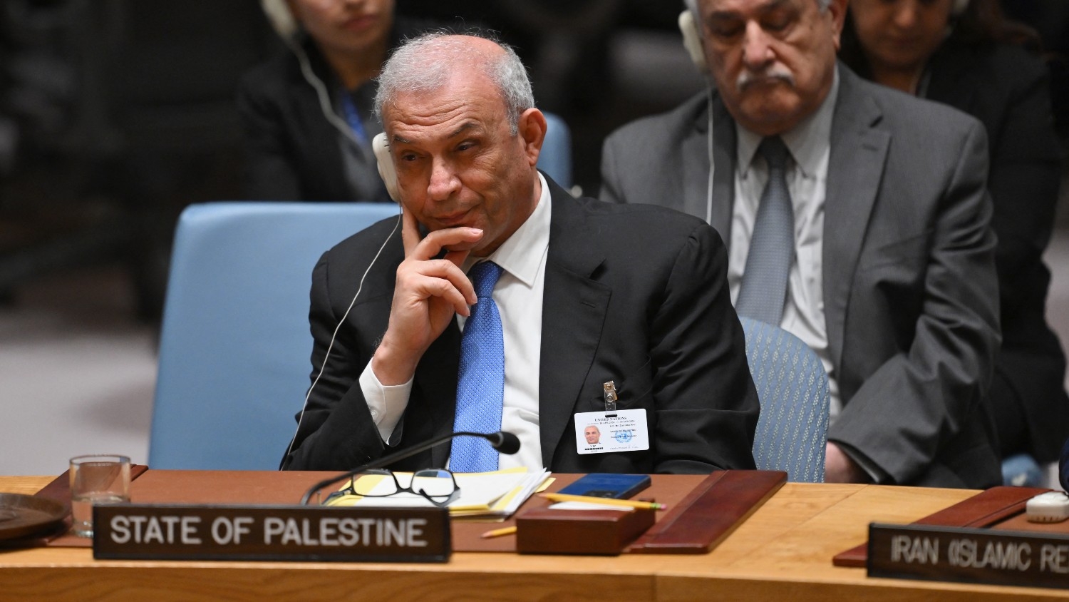 Ziad Abu-Amr, member of the Palestinian Legislative Council, listens during a UN Security Council meeting at UN headquarters in New York City on 18 April 2024.