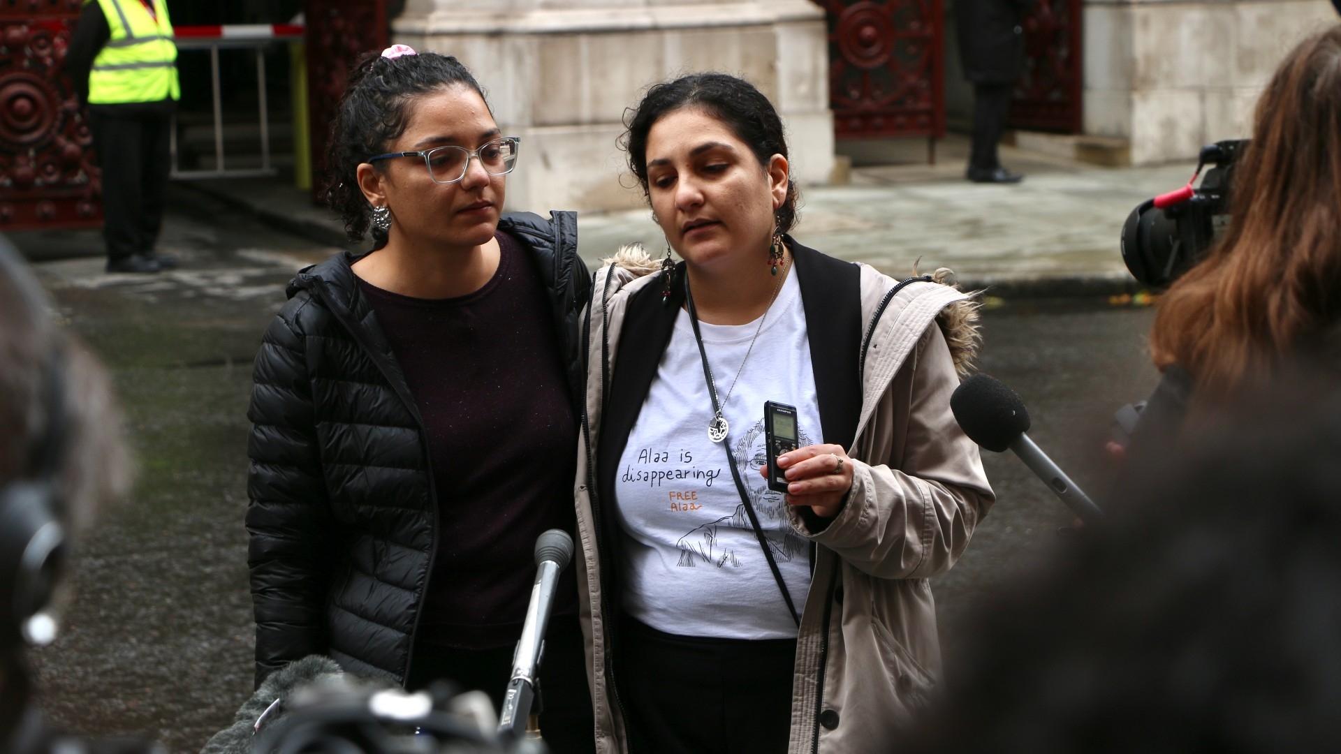 Sanaa (left) and Mona Seif (right), sisters of jailed British-Egyptian writer Alaa Abd-el Fattah, speak during a press conference in London on 3 November 2022 (MEE/Hossam Sarhan)