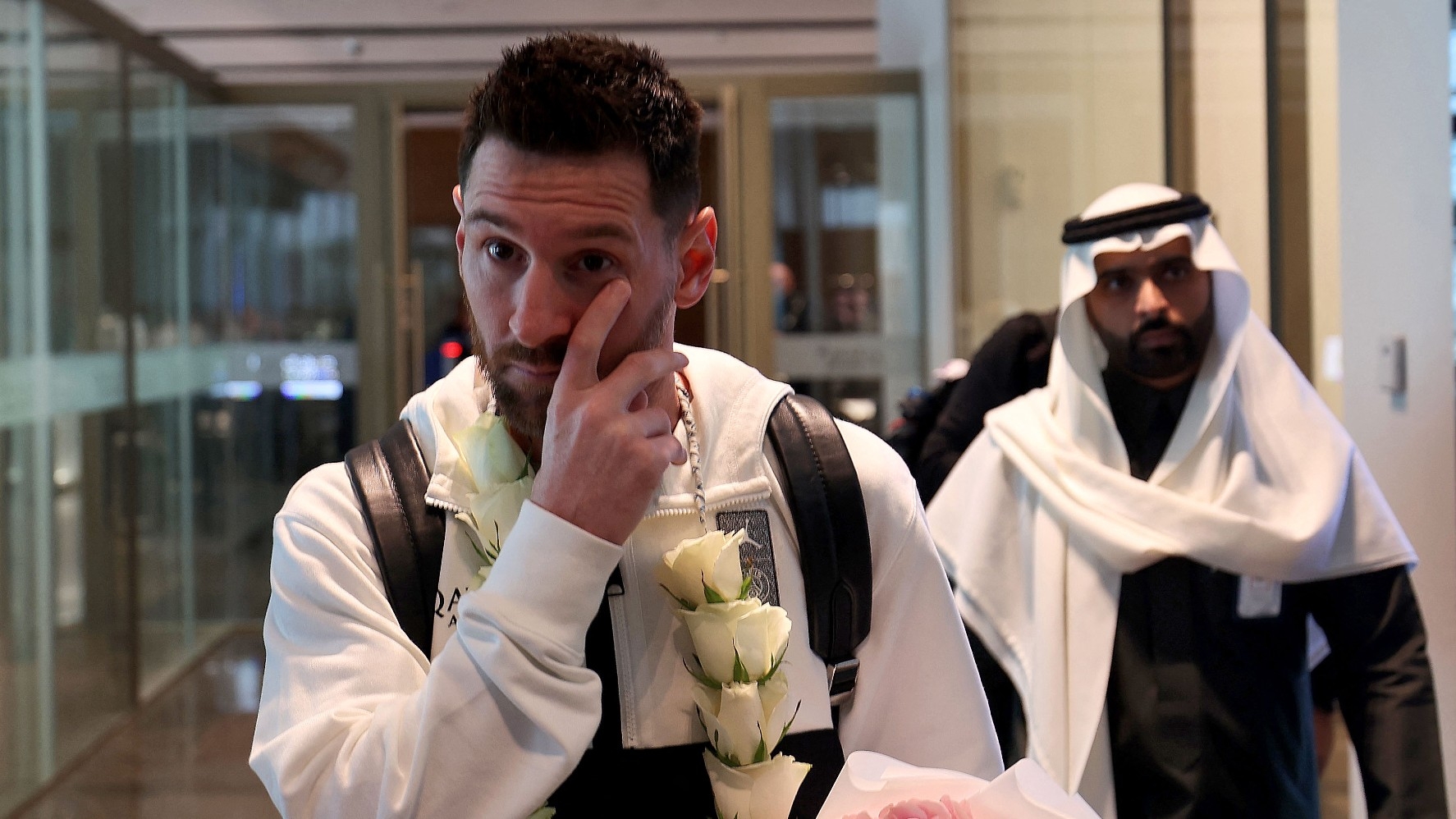 Lionel Messi arrives at an airport in Riyadh during a visit to Saudi Arabia on 19 January, 2023 (AFP)