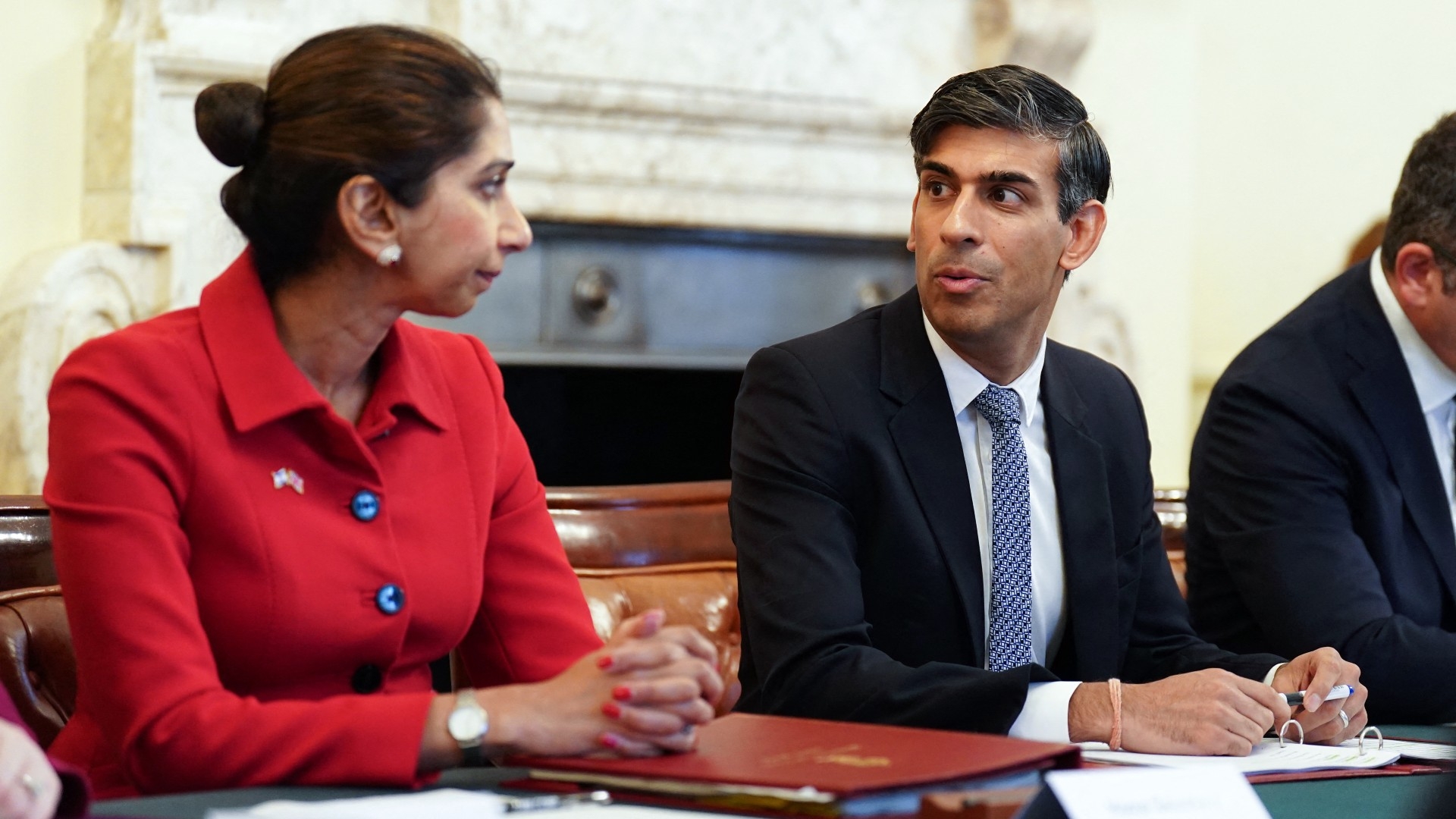 Britain's Prime Minister Rishi Sunak (R) and Britain's Home Secretary Suella Braverman attend at 10 Downing Street in London on 12 October 2023 (AFP)