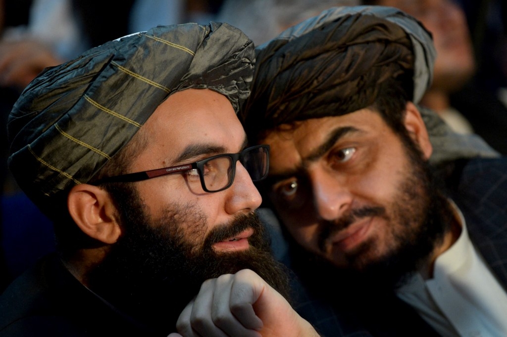 Taliban members attend a gathering to mark the first anniversary of their return to power in Kabul on 15 August 2022 (AFP)