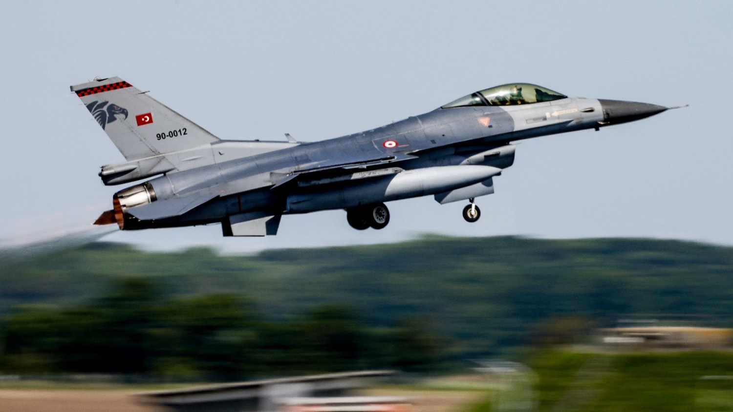 A Turkish F-16 fighter plane takes off at the Air Defender Exercise 2023 in the military airport of Jagel, northern Germany, on 9 June 2023.