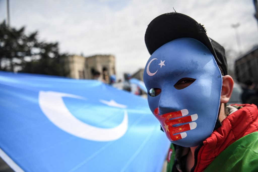 Uighur activists gather outside the Chinese consulate in Istanbul 