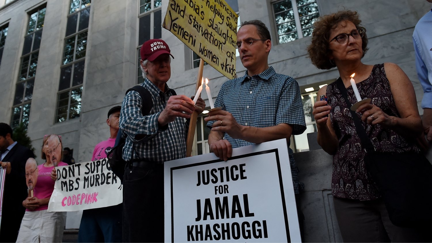 People gather in front of the Embassy of Saudi Arabia on 2 October 2019 in Washington to remember Jamal Khashoggi.