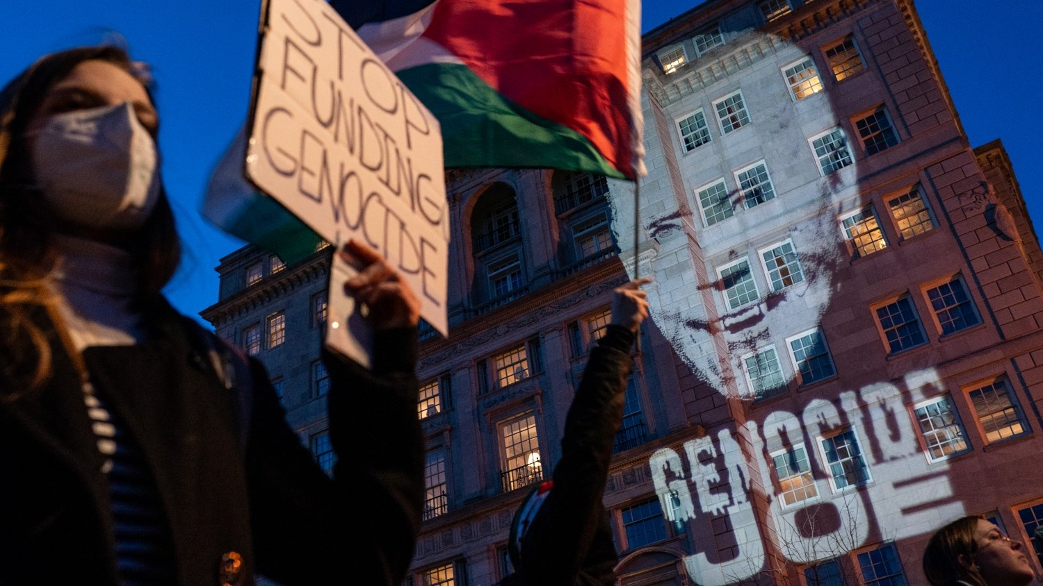 An image of President Joe Biden is projected on to a building during a Pro-Palestinian protest near the White House on 7 March 2024 in Washington DC.