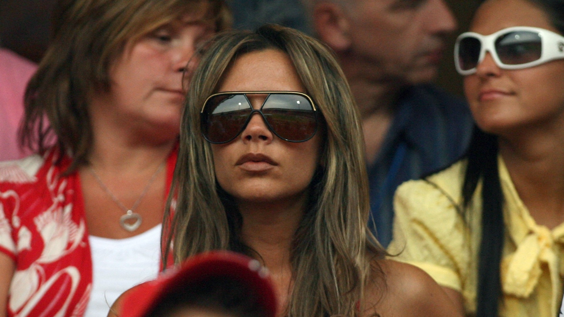 Fashion designer and singer Victoria Beckham watches her husband David during a World Cup match in Nuremberg on 15 June 2006 (AFP/File photo)