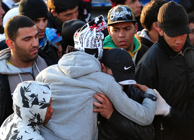 Tunisian migrants arrive in Italy (AFP)