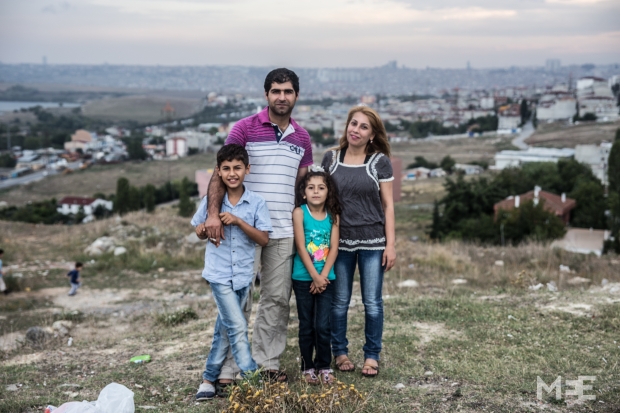 The Nasro family from Aleppo (left to right: Jewan, Mohamed, Rojda, Roshin) with the city of Istanbul in the background (MEE/Willemjan Vandenplas)
