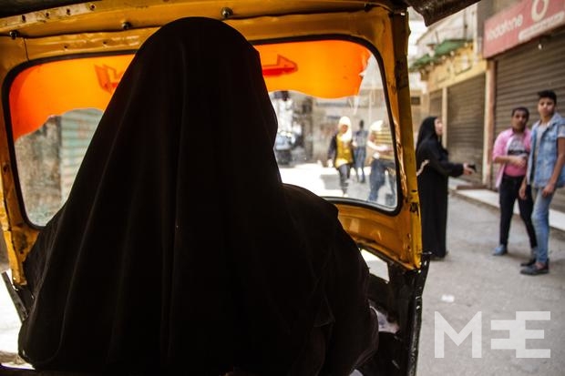 Sabeh Ahmed, 38, a widow with four children and a 90-year-old mother to care for, drives a tuk-tuk for a living (MEE/Belal Darder)