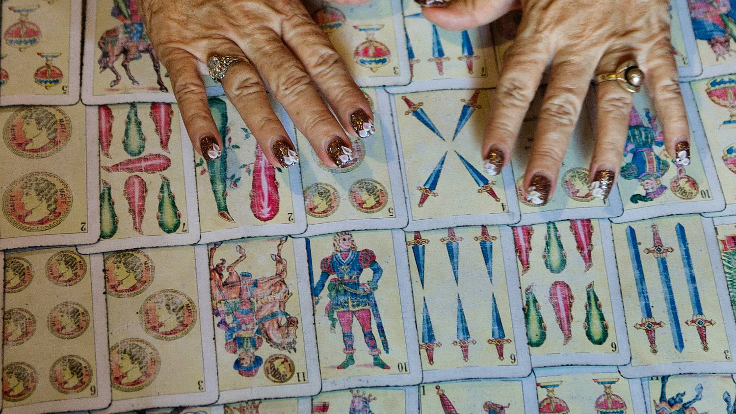 Tarot cards often feature swords in their imagery, an relic from the cards Mamluk origins (AFP/Paul J. Richards)